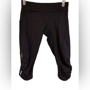 Lululemon Size 8 Ebb to Street Leggings Black Ruched Side Zip Back Pocket